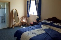 Double bedroom, showing ensuite in Fairgreen Holiday Cottages, Dungloe, Co. Donegal